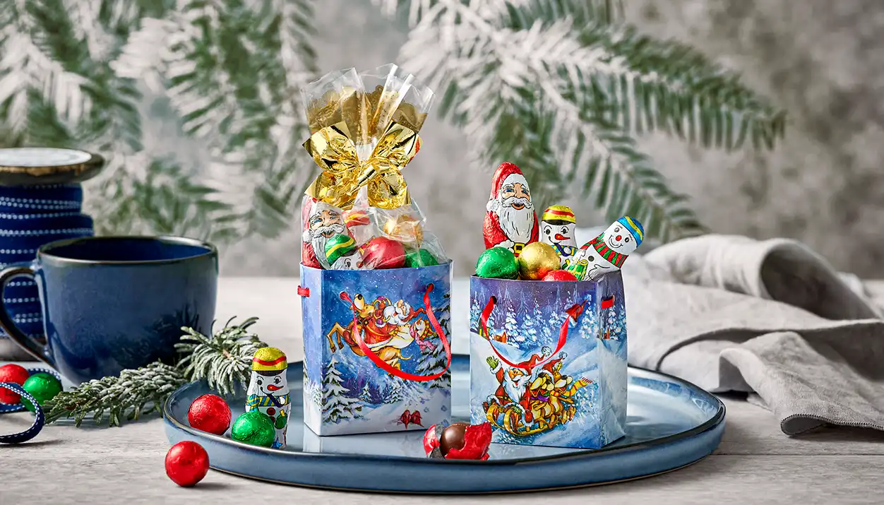 Präsenttütchen Weihnachtsmann auf Schlitten